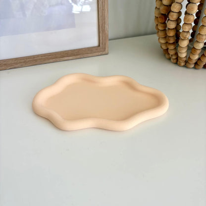 Cloud Tray 3d printed styled on a white table with a picture and wooden base lamp