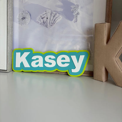 Custom 3D Printed Wall Name Decor Styled on shelf