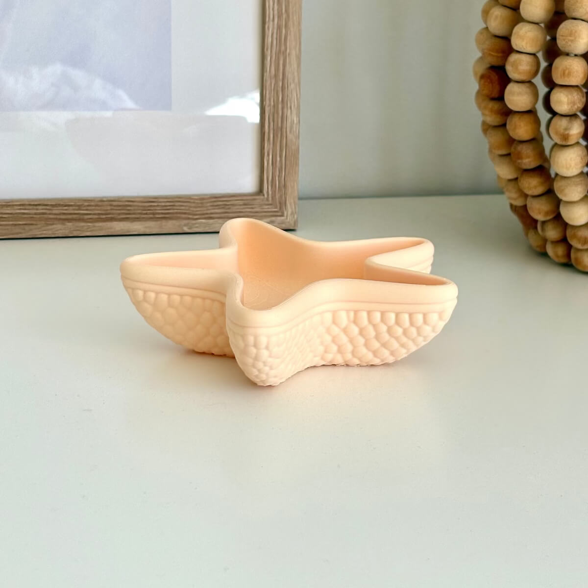 Starfish tray styled on a white table with a picture 3D printed